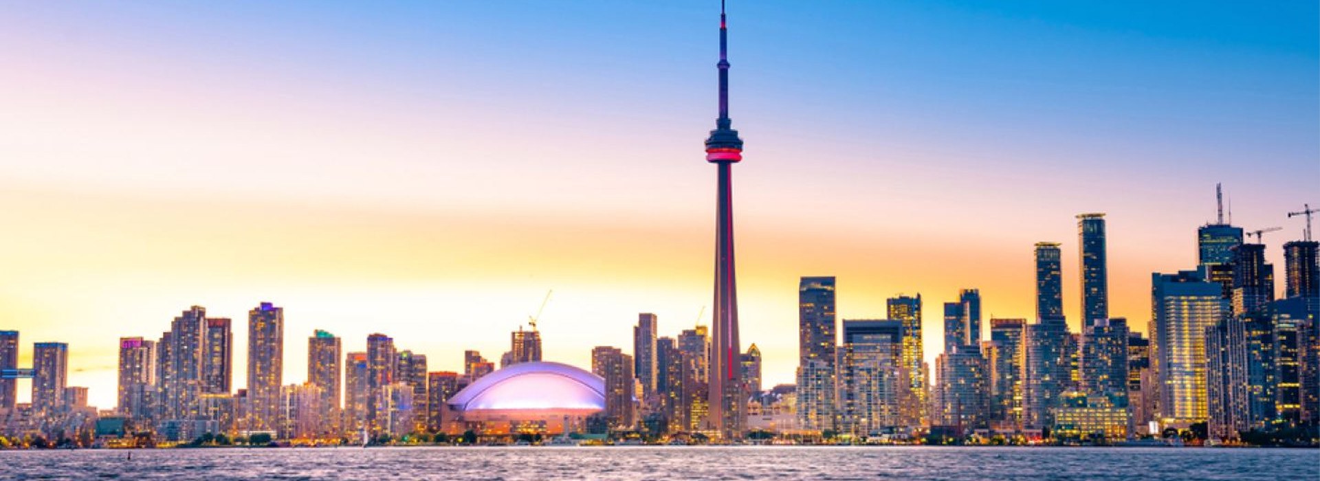 Toronto skyline at sunset with the CN Tower