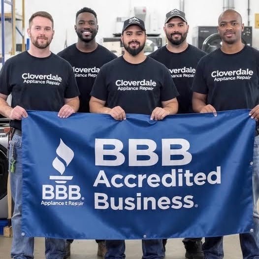 The Cloverdale Appliance Repair team holding a BBB Accredited Business banner.